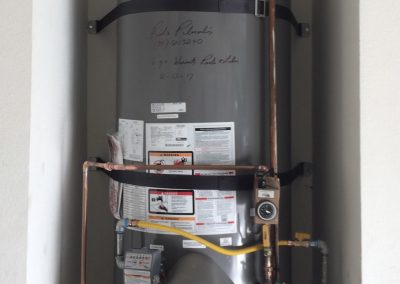 75 Gallon Rheem Water Heater with owner's Circulating Pump and Smitty Pan